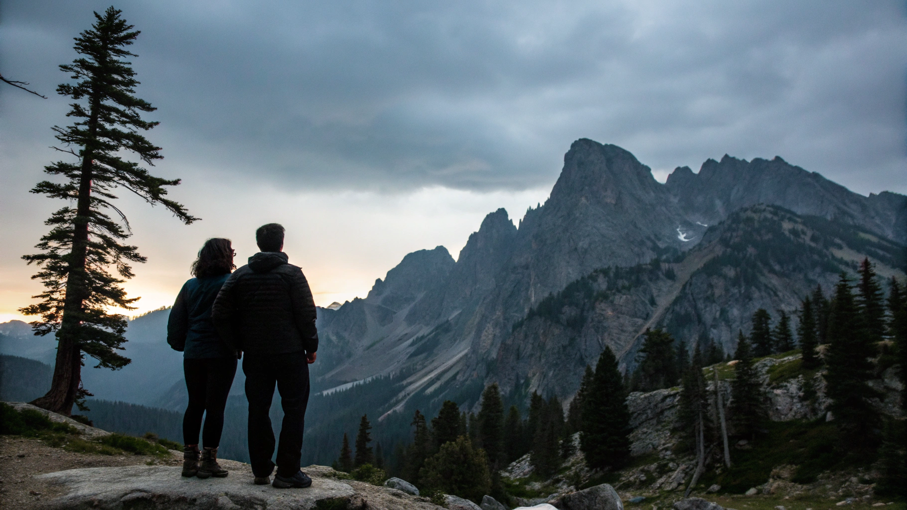 Sunset silhouette of the couple